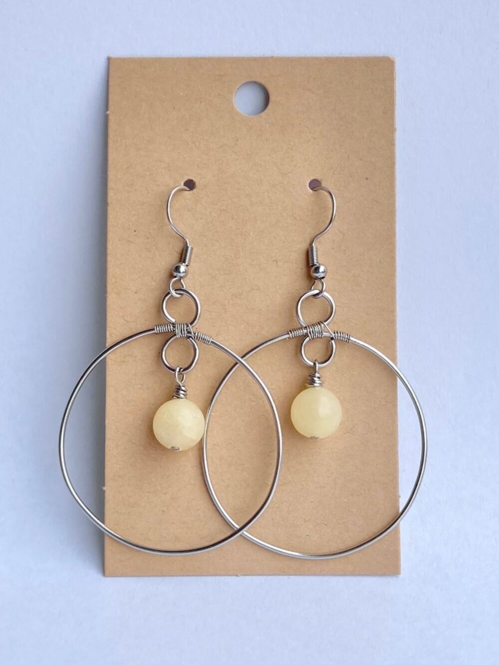 Handmade classic & feminine stainless steel hoop earrings with yellow jade beads